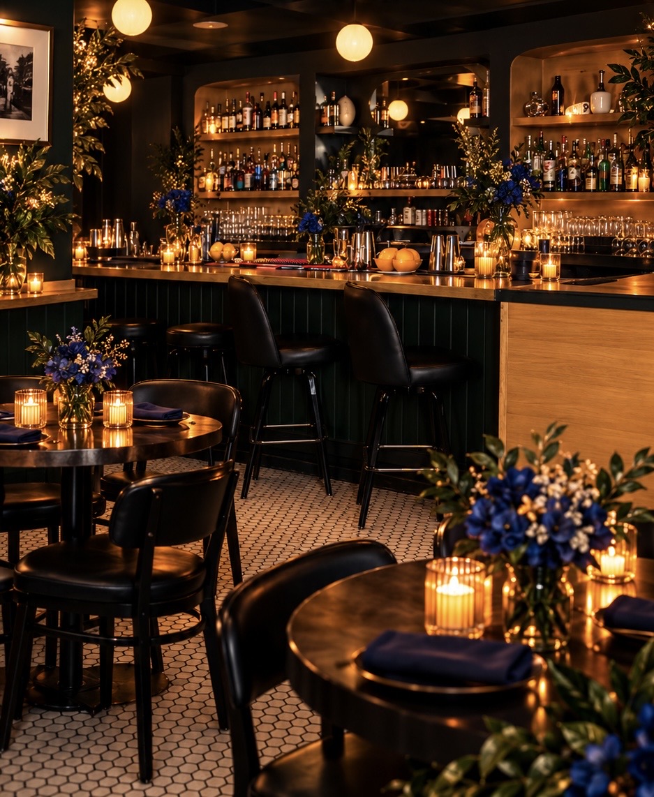 Candlelit tables and bar inside All Purpose Bar in NoDa.
